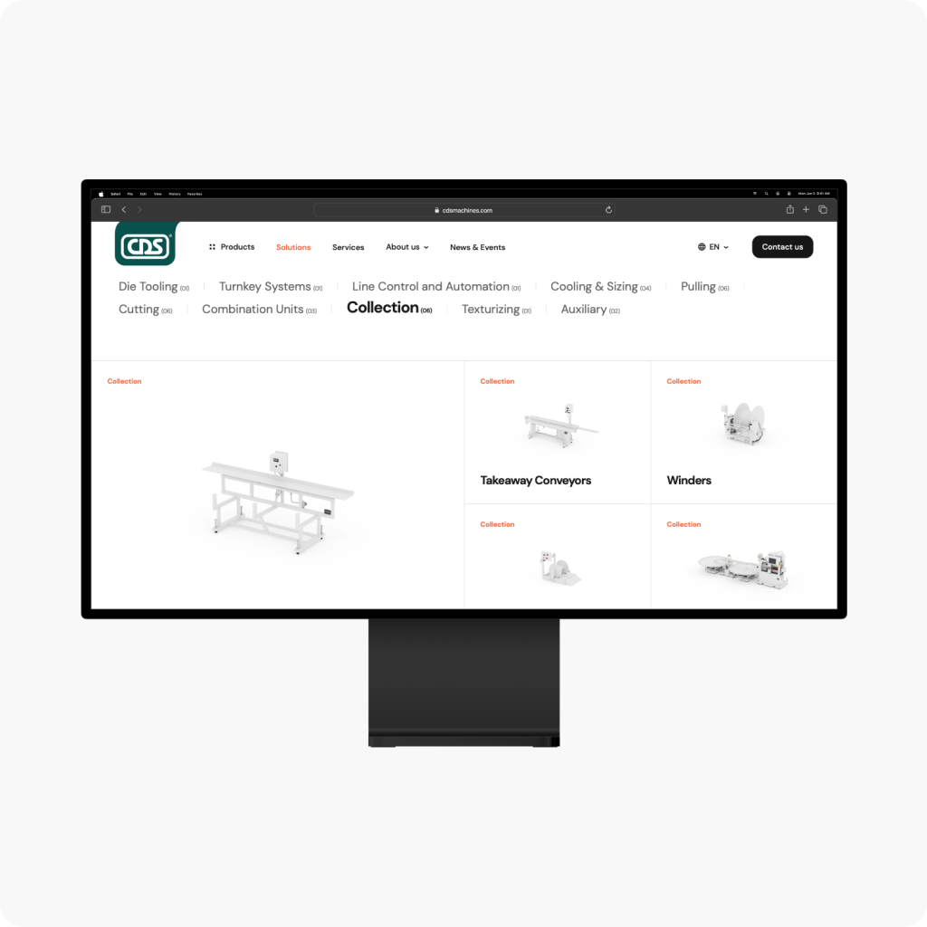 The computer screen showcases a sleek UI design with a website featuring product categories such as conveyors and winders in an intuitive grid layout.