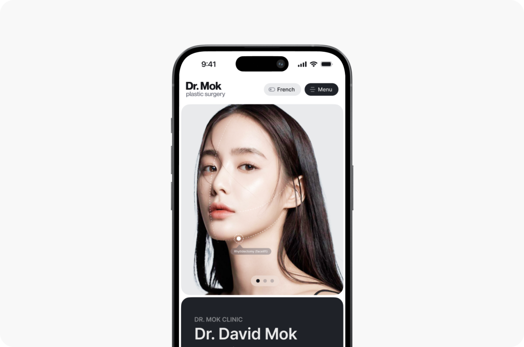 A smartphone showcases a professionally crafted cosmetic surgery website, featuring a womans face, designed by a leading website design agency in Calgary.