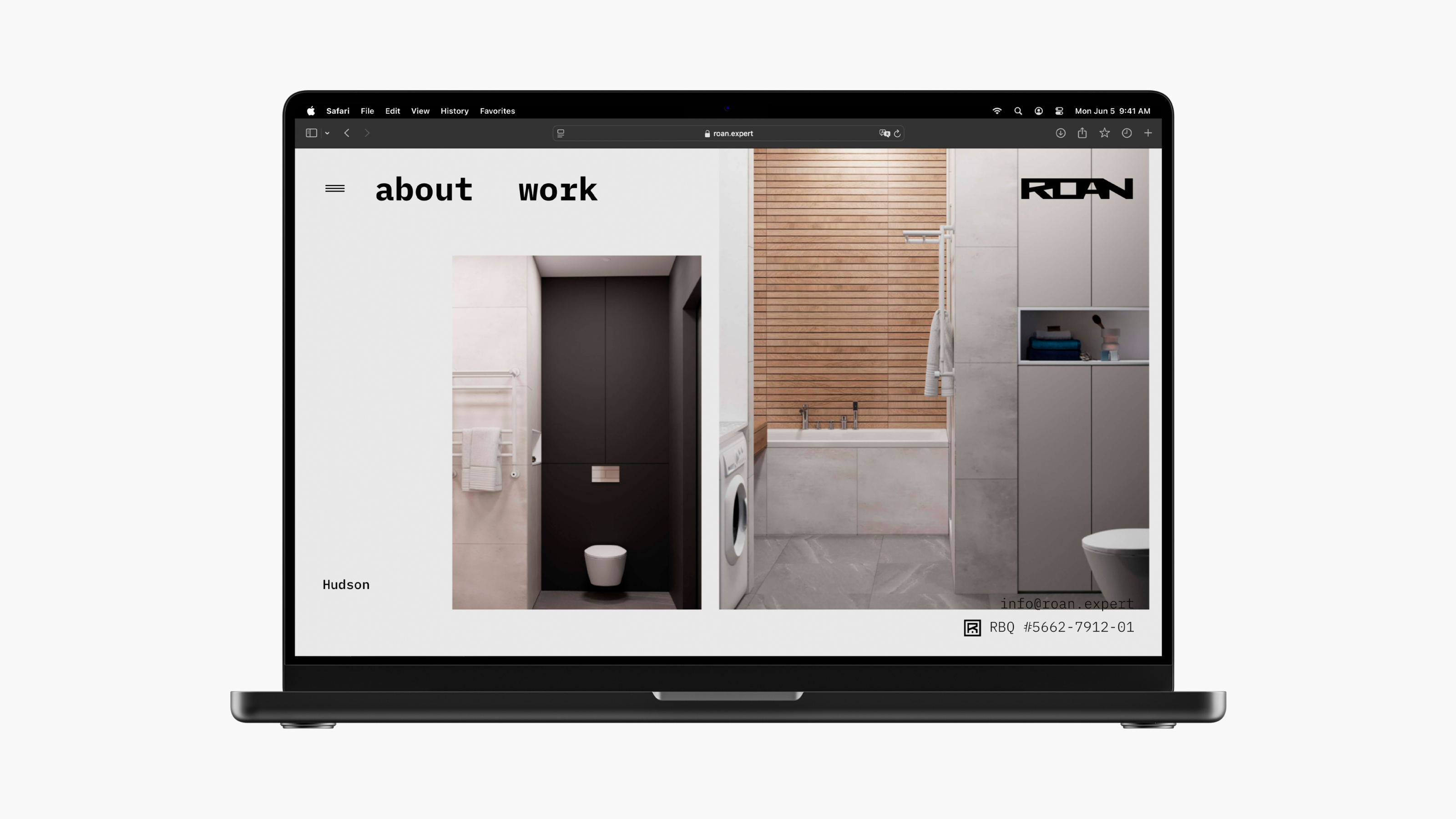 A laptop showcasing a minimalist construction website designed by Webgamma. It highlights sleek bathroom images, with text links. It's a perfect example of cutting-edge website design in Stoney Creek.